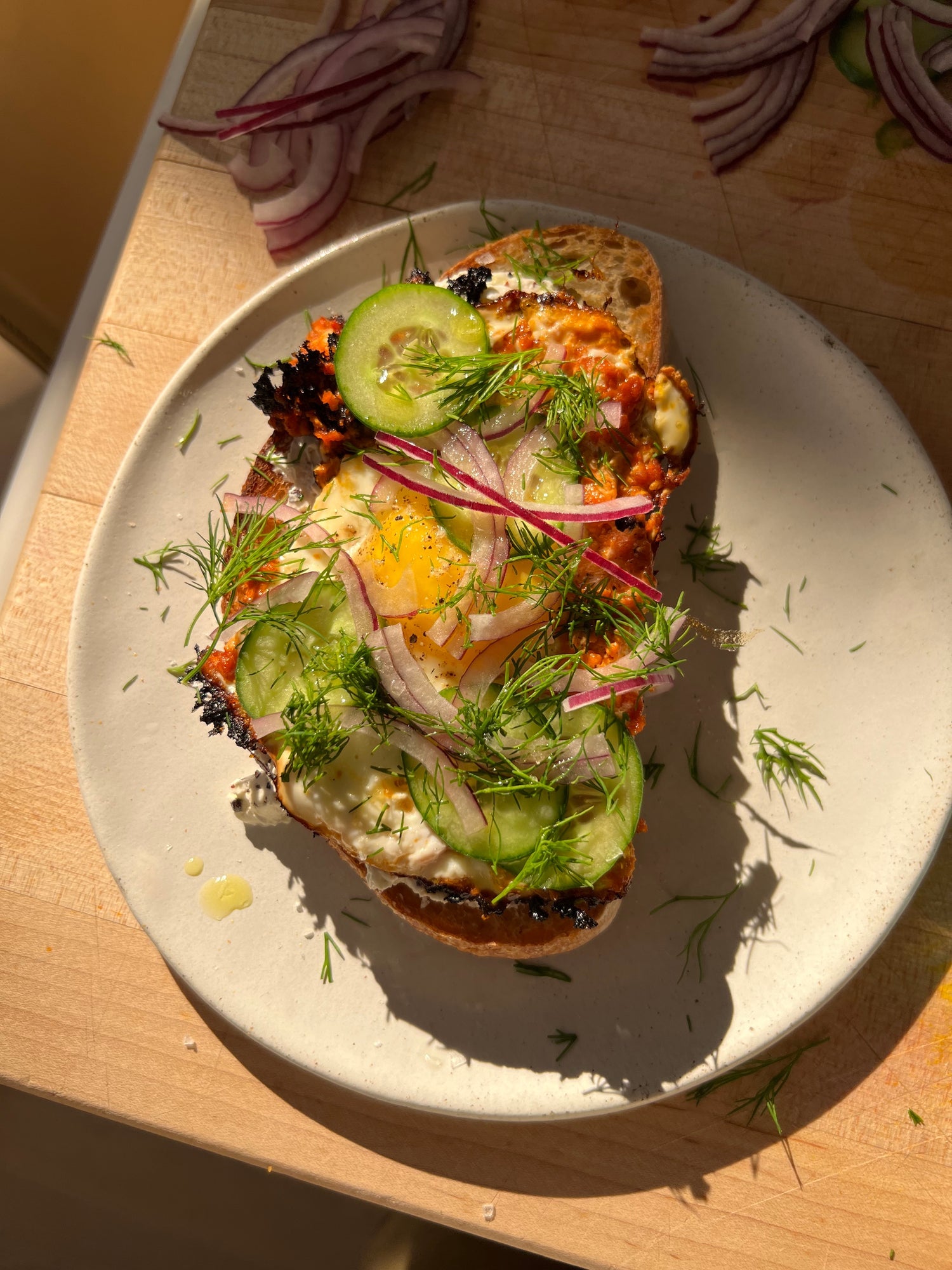 Harissa Eggs on Labneh Toast – Eden Eats