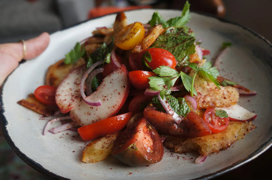 Sumac pita, tomato & peach panzanella with fresh mint & parsley