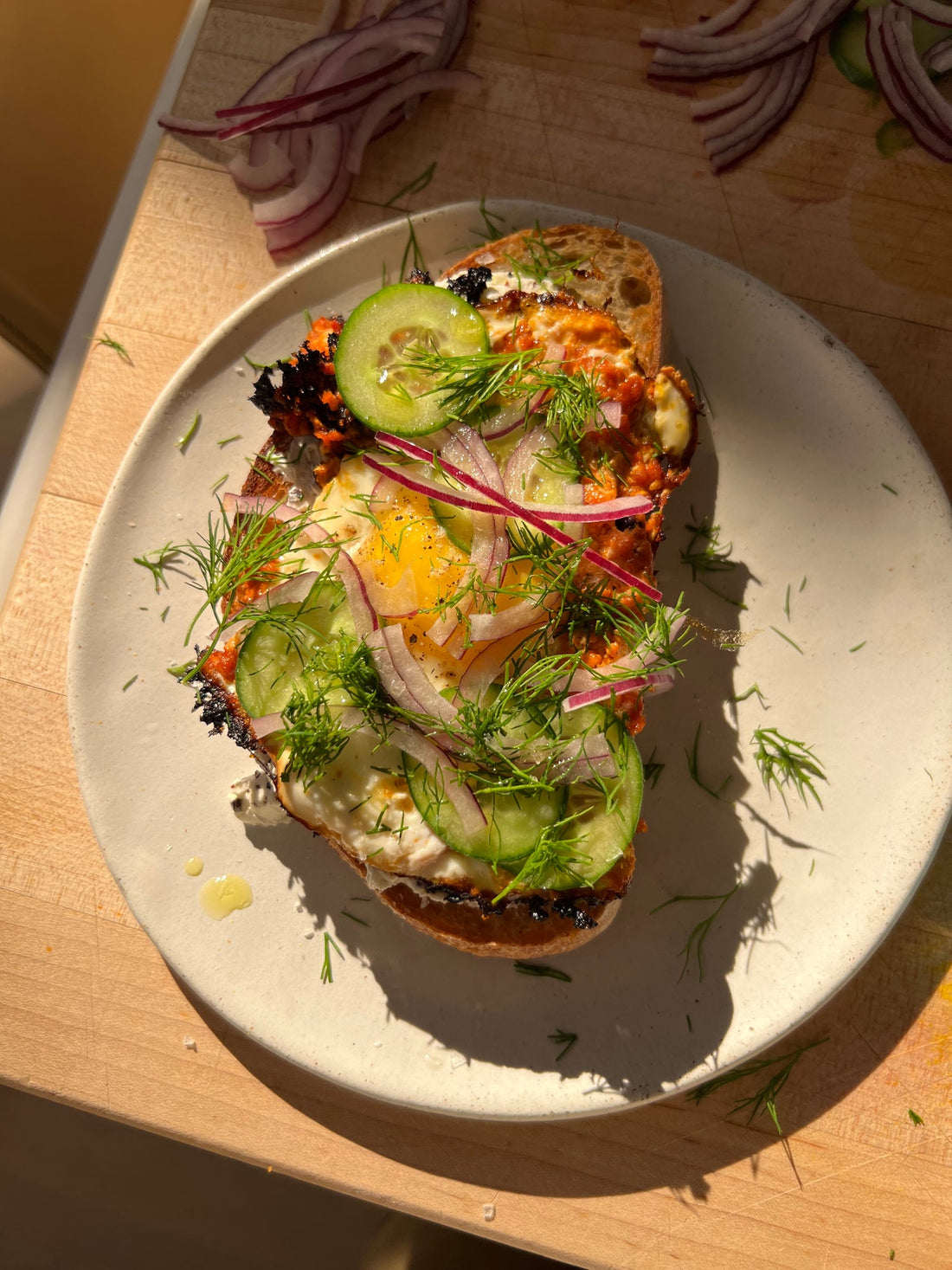 Harissa Eggs on Labneh Toast
