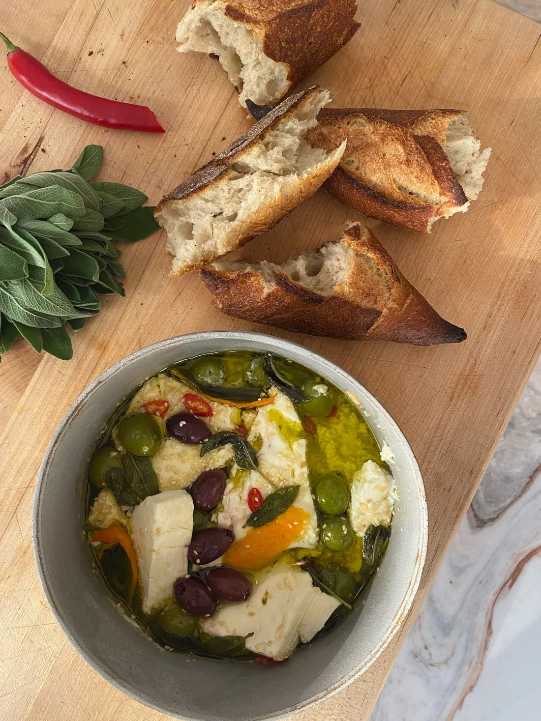 BAKED FETA WITH OLIVES, SESAME, SAGE & HONEY