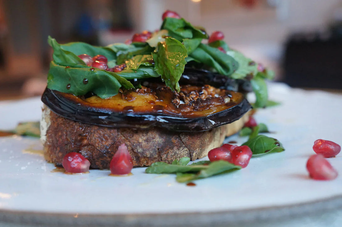Grilled Sourdough with Greek Yogurt, Pickled Eggplant, Pomegranate & Fresh herbs