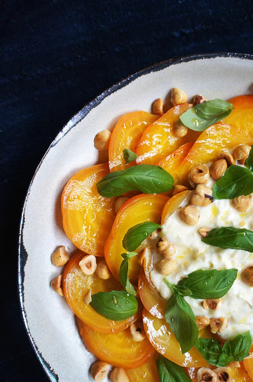 Yellow beets with lemony creme fraiche, fresh basil and toasted hazelnuts