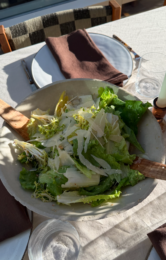 Crunchy leafy green salad with sesame shallot vinaigrette